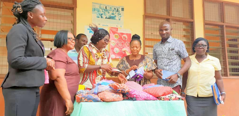 Walnut card tray with white powder coated steel divider and 3 punchout holes.