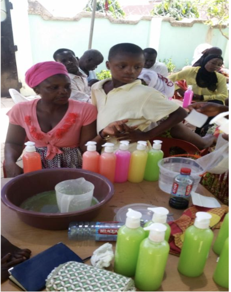 Walnut card tray filled with cards and card angled in dedicated groove.