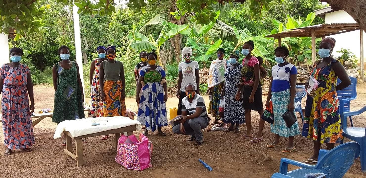 Walnut card tray filled with cards and card angled in dedicated groove.