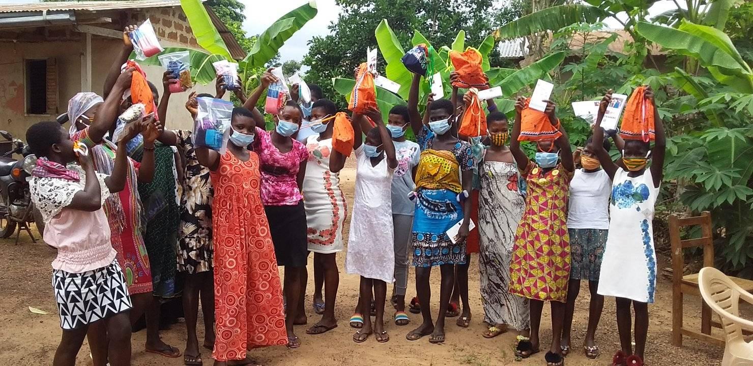 Walnut card tray filled with cards and card angled in dedicated groove.